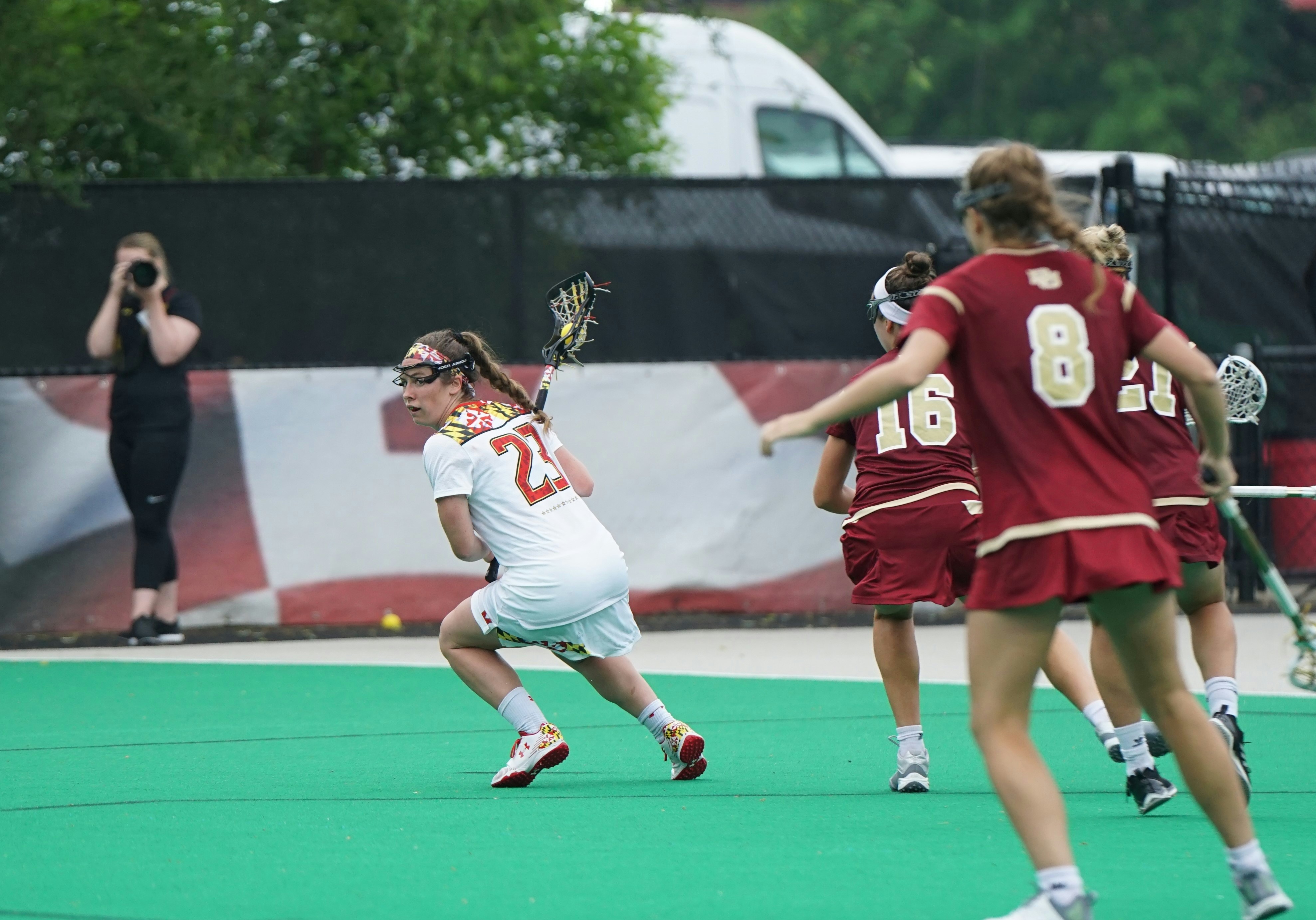 College lacrosse players competing during a game