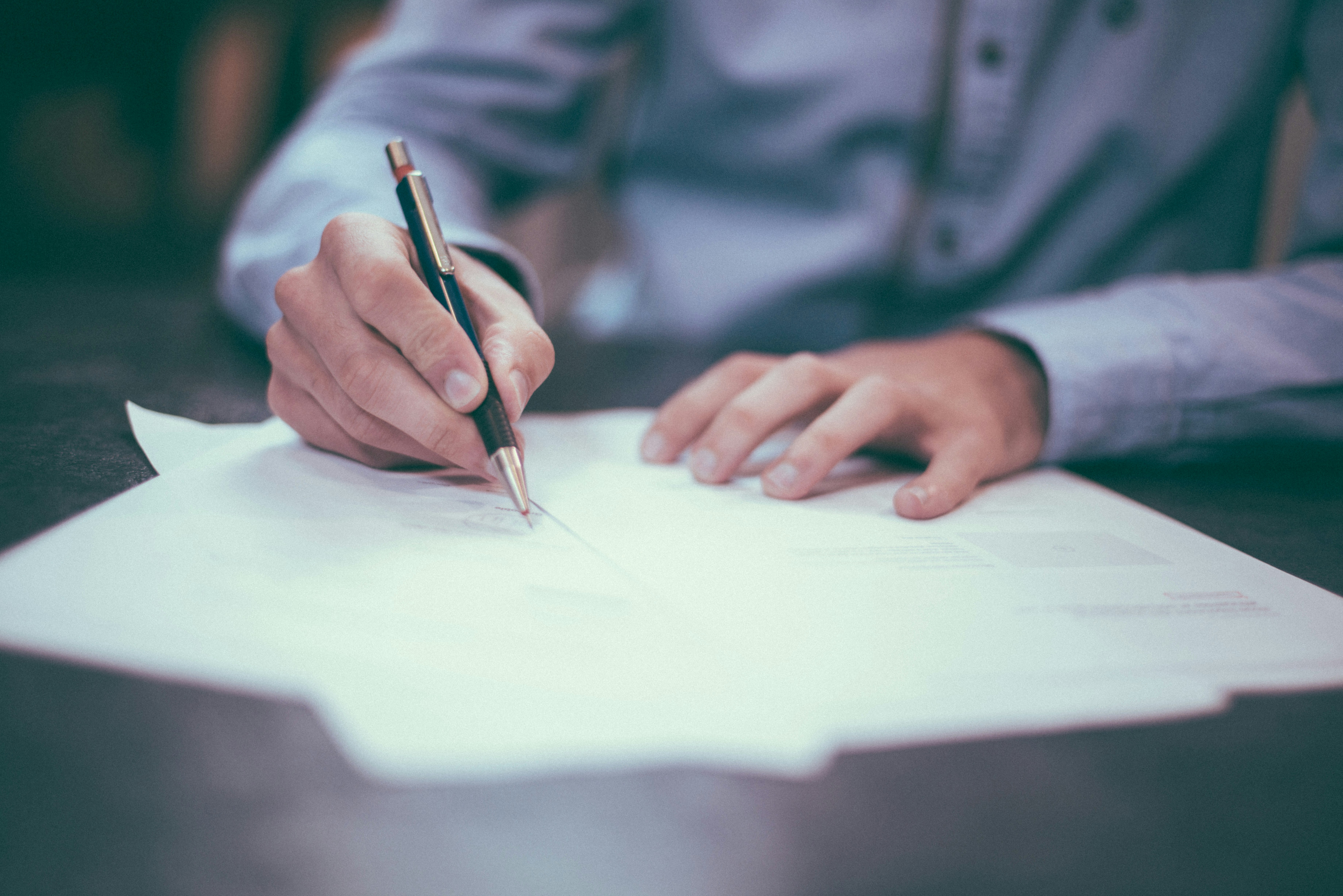Person signing a written agreement
